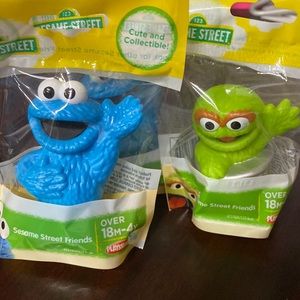 Cookie Monster and Oscar the grouch figurines